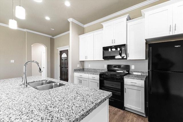 6510 Arabella, Houston, TX 77091 - kitchen featuring black appliances, a sink, arched walkways, crown molding, and white cabinetry