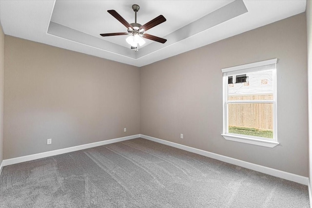 6510 Arabella, Houston, TX 77091 - unfurnished room with a raised ceiling, ceiling fan, carpet flooring, and baseboards