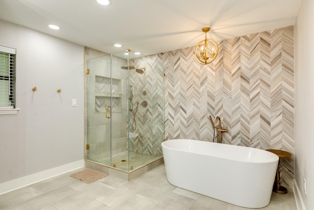 307 County Road 416, Brazoria, TX 77422 - full bathroom featuring a freestanding tub, a shower stall, recessed lighting, baseboards, and tile patterned flooring