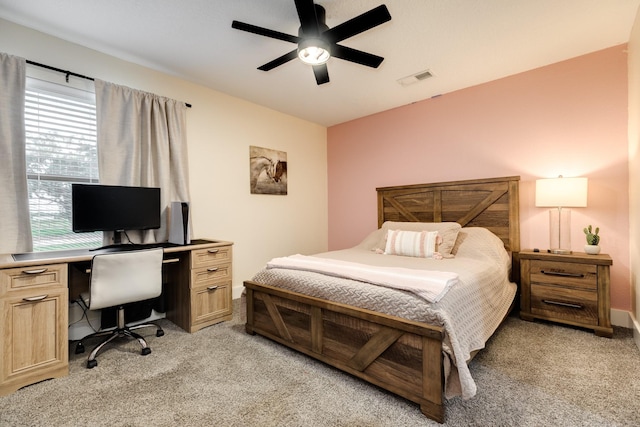 307 County Road 416, Brazoria, TX 77422 - bedroom featuring light colored carpet, a desk, and a ceiling fan