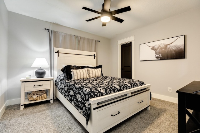 307 County Road 416, Brazoria, TX 77422 - bedroom with light carpet, baseboards, and ceiling fan