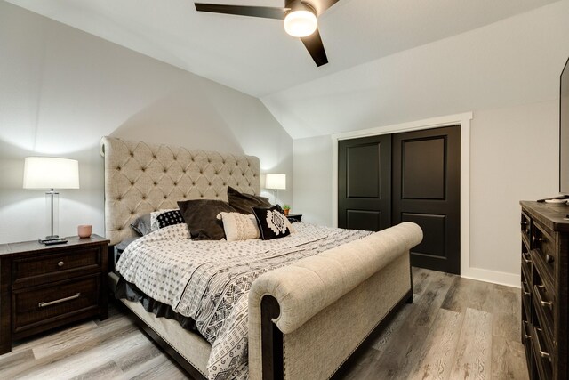 307 County Road 416, Brazoria, TX 77422 - bedroom featuring vaulted ceiling, light wood-style floors, ceiling fan, baseboards, and a closet
