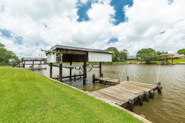 307 County Road 416, Brazoria, TX 77422 - dock with a water view, a yard, and boat lift