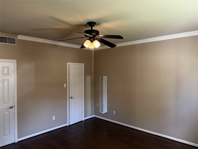 87 April Point Dr S, Conroe, TX 77356 - unfurnished room with ceiling fan, dark wood finished floors, baseboards, and crown molding