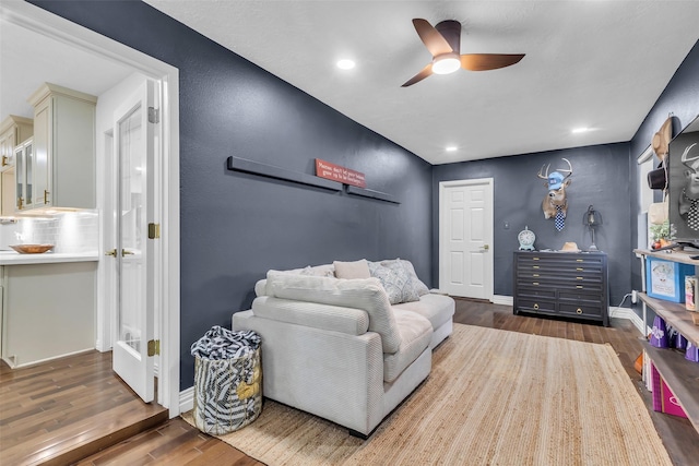 1710 Hill Top Ln, Houston, TX 77339 - living area with wood finished floors, ceiling fan, recessed lighting, and baseboards
