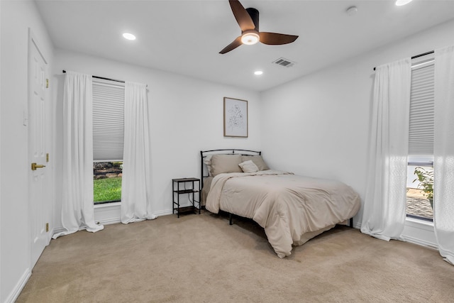 1710 Hill Top Ln, Houston, TX 77339 - bedroom with light colored carpet, recessed lighting, ceiling fan, and baseboards