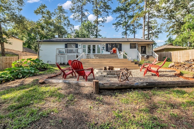 1710 Hill Top Ln, Houston, TX 77339 - back of house featuring a fire pit and a wooden deck