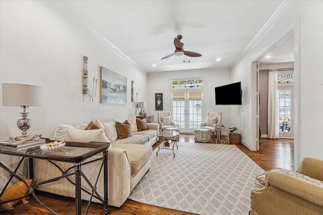 1216 Potomac Dr, Houston, TX 77057 - living room featuring plenty of natural light, wood finished floors, a ceiling fan, recessed lighting, and baseboards