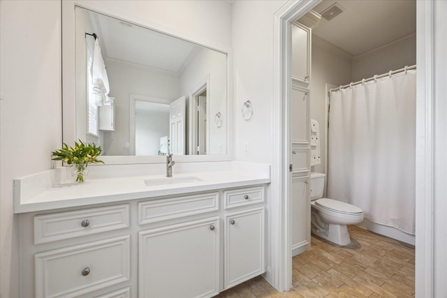 1216 Potomac Dr, Houston, TX 77057 - full bath with ornamental molding, toilet, vanity, wood finished floors, and a shower with shower curtain