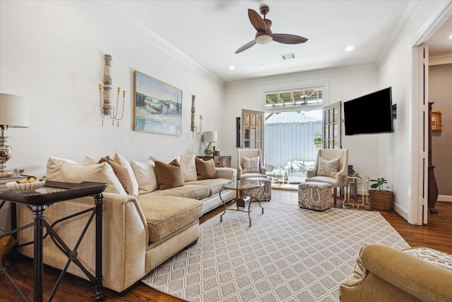 1216 Potomac Dr, Houston, TX 77057 - living room with crown molding, wood finished floors, a ceiling fan, baseboards, and recessed lighting