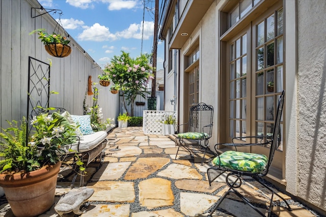 1216 Potomac Dr, Houston, TX 77057 - view of patio / terrace featuring french doors