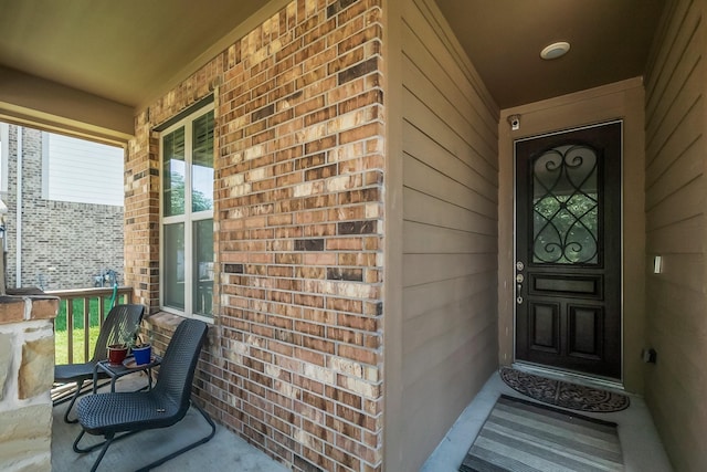 8202 Lockridge Terrace Ln, Cypress, TX 77433 - view of exterior entry with covered porch and brick siding