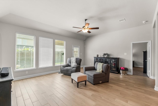 8202 Lockridge Terrace Ln, Cypress, TX 77433 - sitting room with light wood-type flooring, a ceiling fan, and baseboards