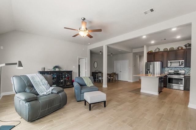 8202 Lockridge Terrace Ln, Cypress, TX 77433 - living area with light wood-style flooring, a ceiling fan, baseboards, and recessed lighting