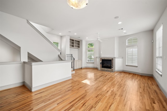 5012 Schuler St, Houston, TX 77007 - unfurnished living room featuring light wood-type flooring, a ceiling fan, recessed lighting, and baseboards