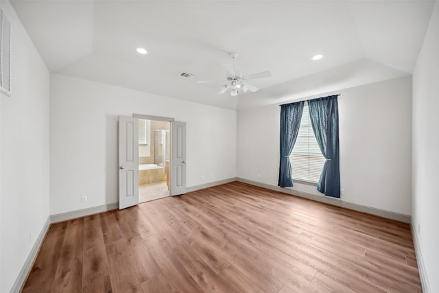 5012 Schuler St, Houston, TX 77007 - unfurnished bedroom with light wood-type flooring, baseboards, recessed lighting, a ceiling fan, and connected bathroom