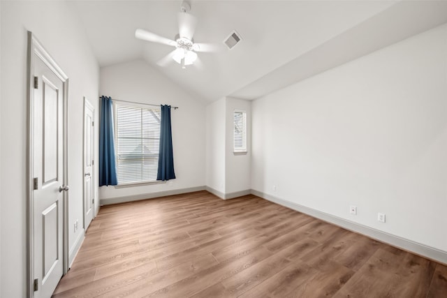 5012 Schuler St, Houston, TX 77007 - unfurnished bedroom featuring light wood-style floors, lofted ceiling, ceiling fan, and baseboards