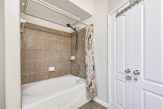 1711 Old Spanish Trl Unit 330, Houston, TX 77054 - bathroom with shower / tub combo and tile patterned floors
