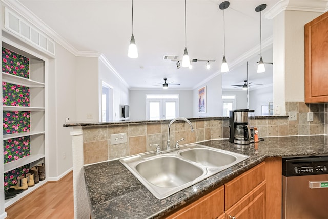 1711 Old Spanish Trl Unit 330, Houston, TX 77054 - kitchen featuring dishwasher, a sink, ceiling fan, ornamental molding, and light wood finished floors