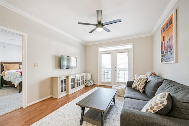1711 Old Spanish Trl Unit 330, Houston, TX 77054 - living room featuring french doors, wood finished floors, crown molding, a ceiling fan, and baseboards