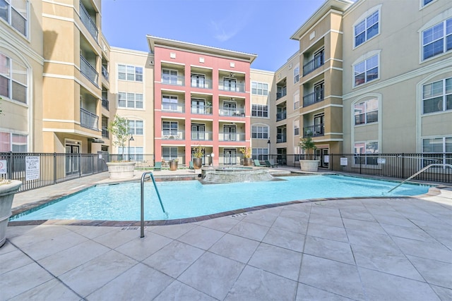 1711 Old Spanish Trl Unit 330, Houston, TX 77054 - view of swimming pool featuring a pool with connected hot tub