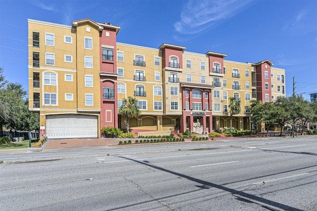 1711 Old Spanish Trl Unit 330, Houston, TX 77054 - view of building exterior featuring an attached garage