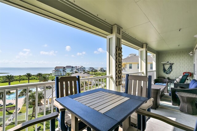 27020 Estuary Dr Unit 302, Galveston, TX 77554 - balcony with a water view and an outdoor hangout area