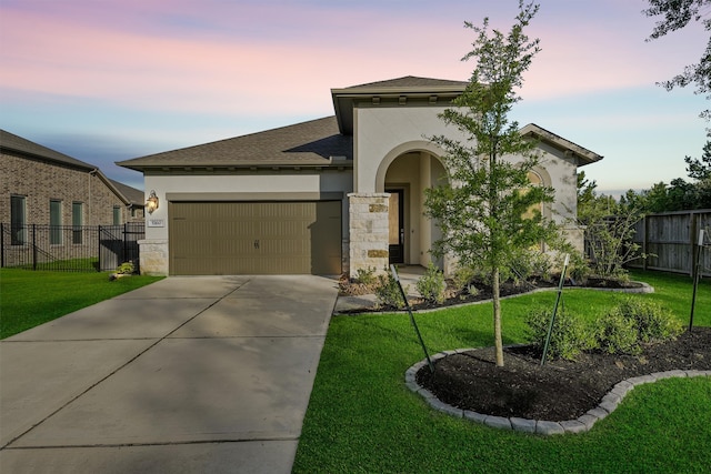 5160 Andorra Bend Ln, Porter, TX 77365 - mediterranean / spanish home featuring a garage, stucco siding, driveway, and roof with shingles