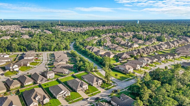 5160 Andorra Bend Ln, Porter, TX 77365 - aerial view of property's location featuring nearby suburban area and a heavily wooded area