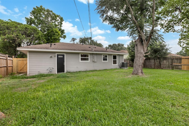 5858 Beldart St, Houston, TX 77033 - rear view of property featuring central AC unit