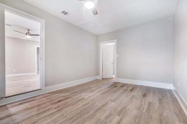 5858 Beldart St, Houston, TX 77033 - unfurnished room featuring ceiling fan, light wood finished floors, and baseboards