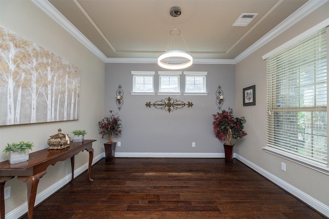 27619 Dalton Bluff Ct, Katy, TX 77494 - foyer with wood finished floors, a tray ceiling, and crown molding