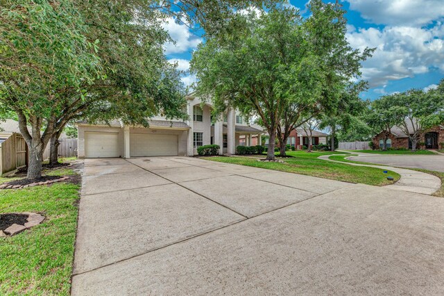 3604 Dogwood Blossom Ct, Pearland, TX 77581 - view of front facade featuring concrete driveway and an attached garage