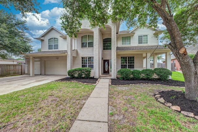 3604 Dogwood Blossom Ct, Pearland, TX 77581 - view of front of property featuring a garage, concrete driveway, brick siding, and roof with shingles