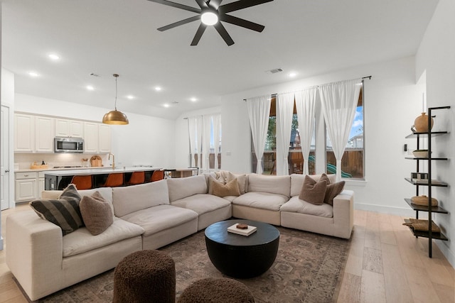 17460 Chestnut Cove Dr, Conroe, TX 77302 - living room with a ceiling fan, light wood-style flooring, recessed lighting, and baseboards