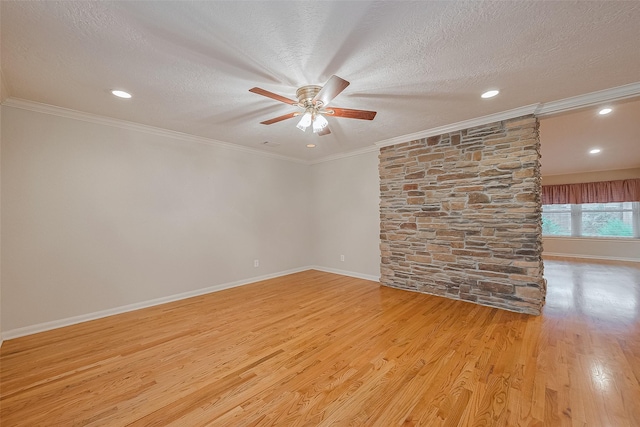2718 Silver Falls Dr, Kingwood, TX 77339 - unfurnished room featuring a textured ceiling, a ceiling fan, light wood-type flooring, ornamental molding, and recessed lighting