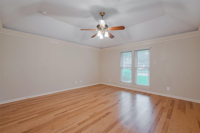 2718 Silver Falls Dr, Kingwood, TX 77339 - unfurnished room with light wood-type flooring, a ceiling fan, a smoke detector, crown molding, and a tray ceiling