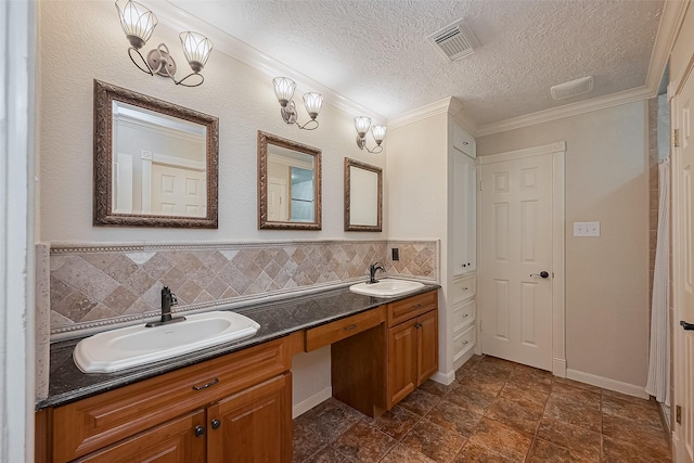 2718 Silver Falls Dr, Kingwood, TX 77339 - bathroom with double vanity, crown molding, and a textured ceiling