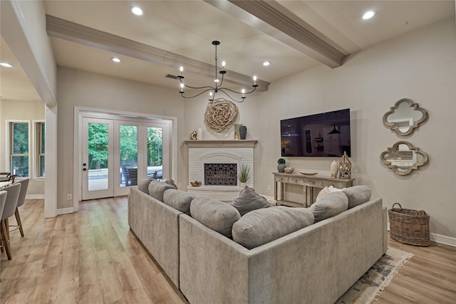 130 Playmoor Pl, Montgomery, TX 77316 - living area with baseboards, light wood finished floors, recessed lighting, beamed ceiling, and a chandelier