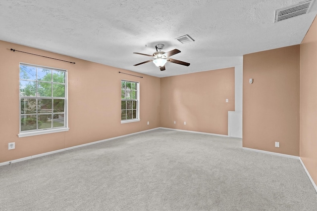 819 Maranon Ln, Houston, TX 77090 - carpeted spare room featuring ceiling fan, baseboards, and a textured ceiling