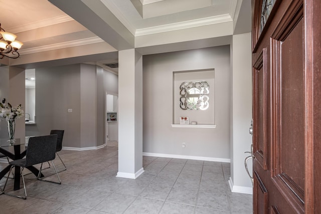51 Eagle Mead Pl, The Woodlands, TX 77382 - entryway with light tile patterned floors, baseboards, a chandelier, and crown molding