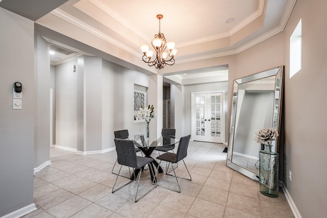 51 Eagle Mead Pl, The Woodlands, TX 77382 - dining room with a raised ceiling, a chandelier, light tile patterned flooring, crown molding, and french doors