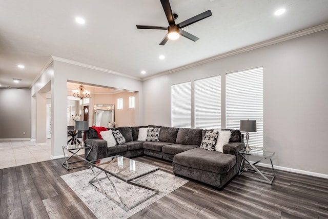 51 Eagle Mead Pl, The Woodlands, TX 77382 - living room with a chandelier, ornamental molding, a ceiling fan, recessed lighting, and baseboards