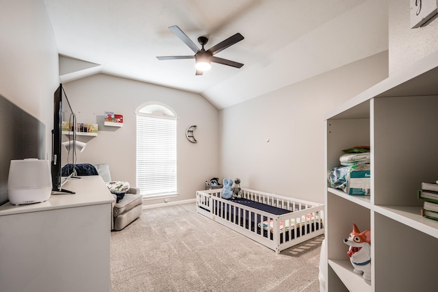 51 Eagle Mead Pl, The Woodlands, TX 77382 - bedroom with a crib, carpet flooring, lofted ceiling, a ceiling fan, and baseboards
