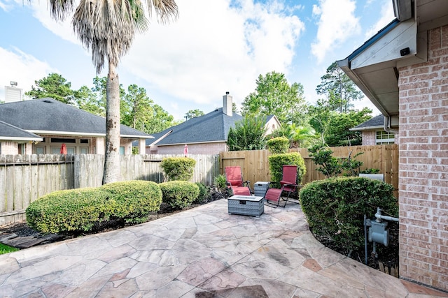 51 Eagle Mead Pl, The Woodlands, TX 77382 - fenced backyard featuring a patio