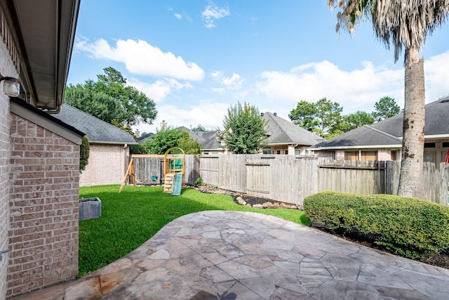 51 Eagle Mead Pl, The Woodlands, TX 77382 - view of patio with a playground