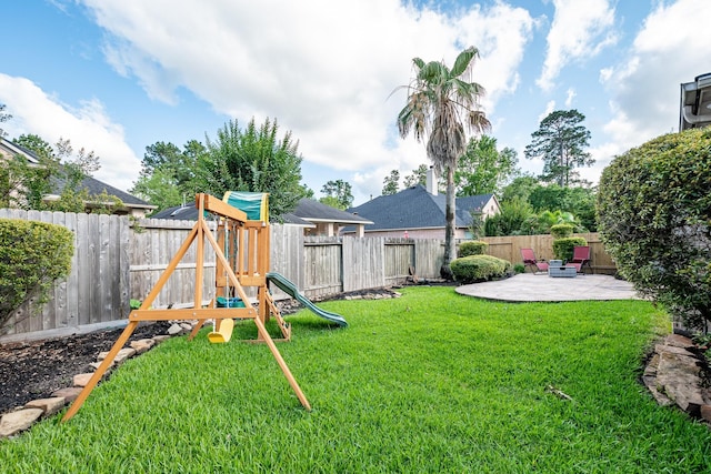 51 Eagle Mead Pl, The Woodlands, TX 77382 - view of yard featuring a playground and a patio area