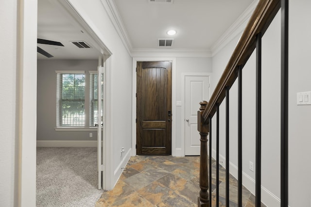 1407 Patterson St, Houston, TX 77007 - foyer with baseboards, ornamental molding, stone finish floors, and stairs