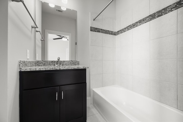 1407 Patterson St, Houston, TX 77007 - full bathroom with vanity, bathing tub / shower combination, a ceiling fan, and tile patterned floors
