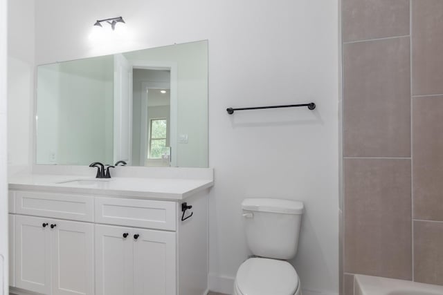 1411 E 34th St, Houston, TX 77022 - bathroom with vanity, toilet, and bathing tub / shower combination